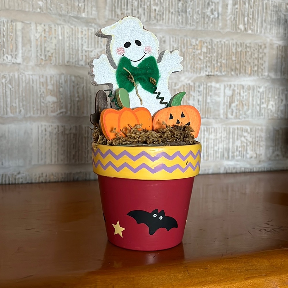 Halloween decor, ghost in flower pot with pumpkins, 7” from top to bottom